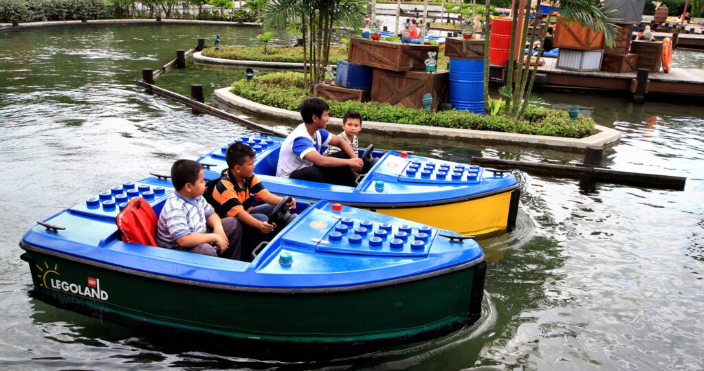 kids in Lego Boats